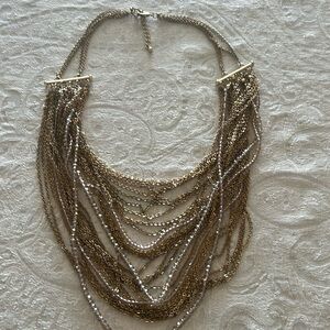 Layered gold necklace with clear beads